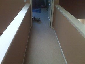 Upstairs bridge. Bathroom at end to the right.