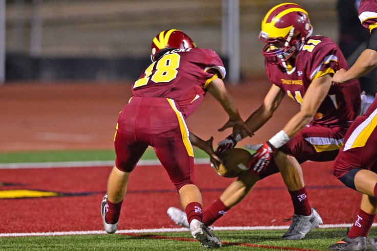 Teaming up with #11 to down a punt right in front of the goal line.