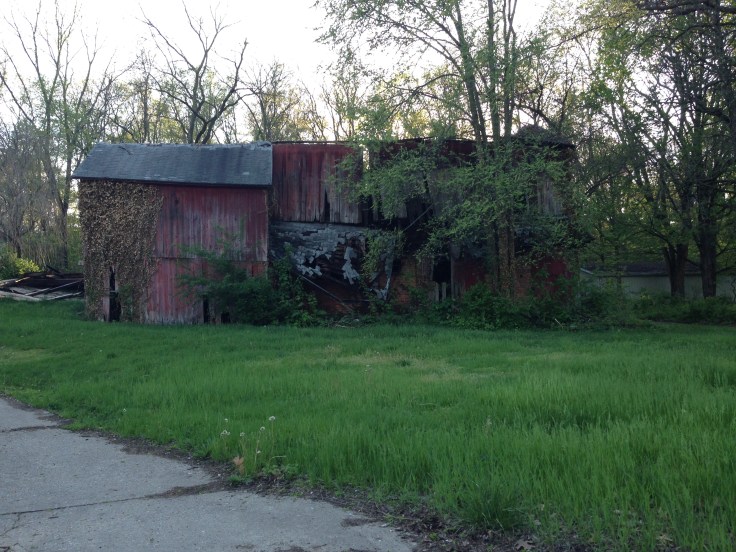 Dilapidated structure in Amish country. Oddly right next to a fairly new looking, large home. 